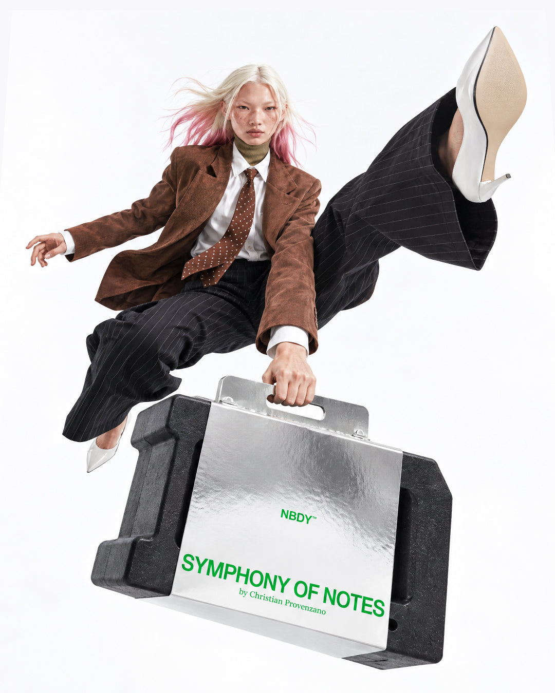 Model leaping with the Symphony of Notes Block case in one hand