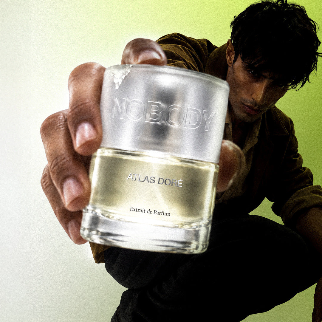 Model holding Atlas Dore in the studio
